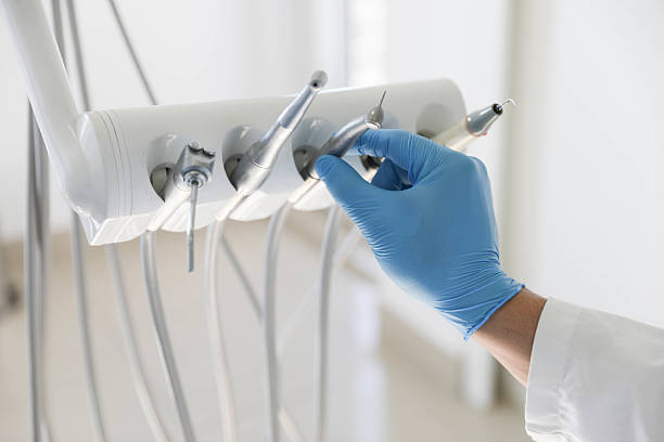 Professional Tooth Extraction technician working in McKinney, TX